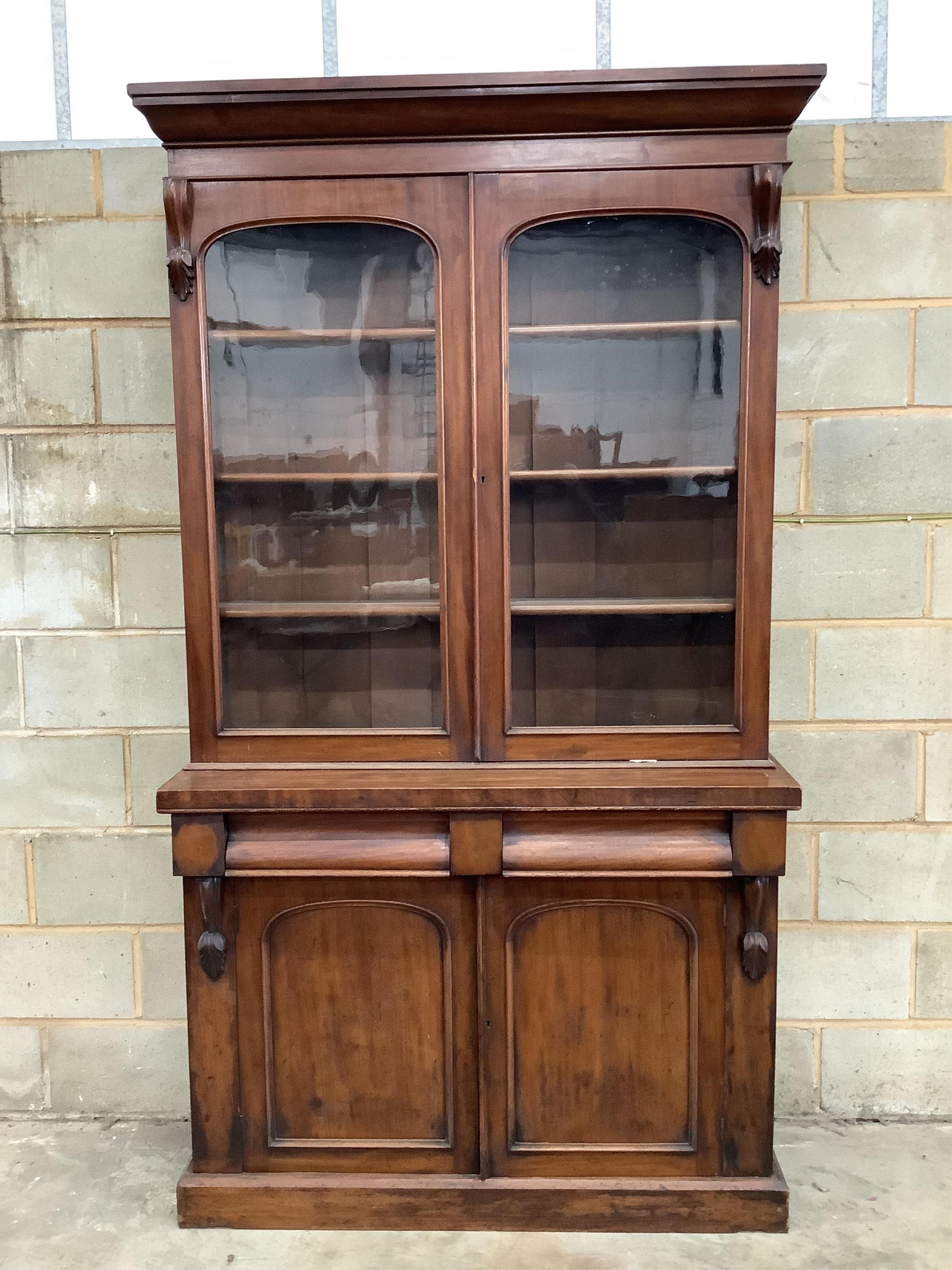 A Victorian mahogany chiffonier bookcase, width 121cm, depth 45cm, height 223cm. Condition - fair